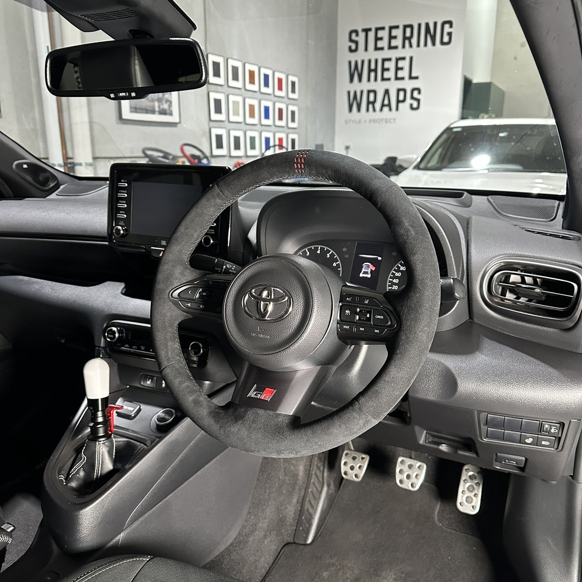 Toyota GR Yaris (2020-2025) Steering Wheel Wrap – Black Alcantara, Black stitch, Red Holo-stripe marker