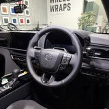 Toyota Camry (2025+) Steering Wheel Wrap – Black Smooth Leather, Black stitch