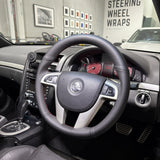 Holden Commodore VE (2006–2013) Steering Wheel Wrap – Black Leather (smooth top, perforated sides), Red stitch