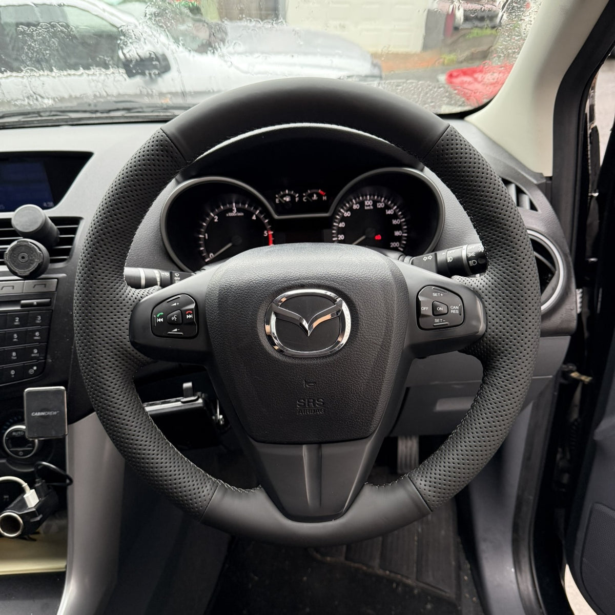 Mazda BT-50 (2011–2015) Steering Wheel Wrap – Black Leather (smooth top, perforated sides), Dark Grey stitch