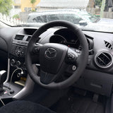 Mazda BT-50 (2011–2015) Steering Wheel Wrap – Black Leather (smooth top, perforated sides), Dark Grey stitch