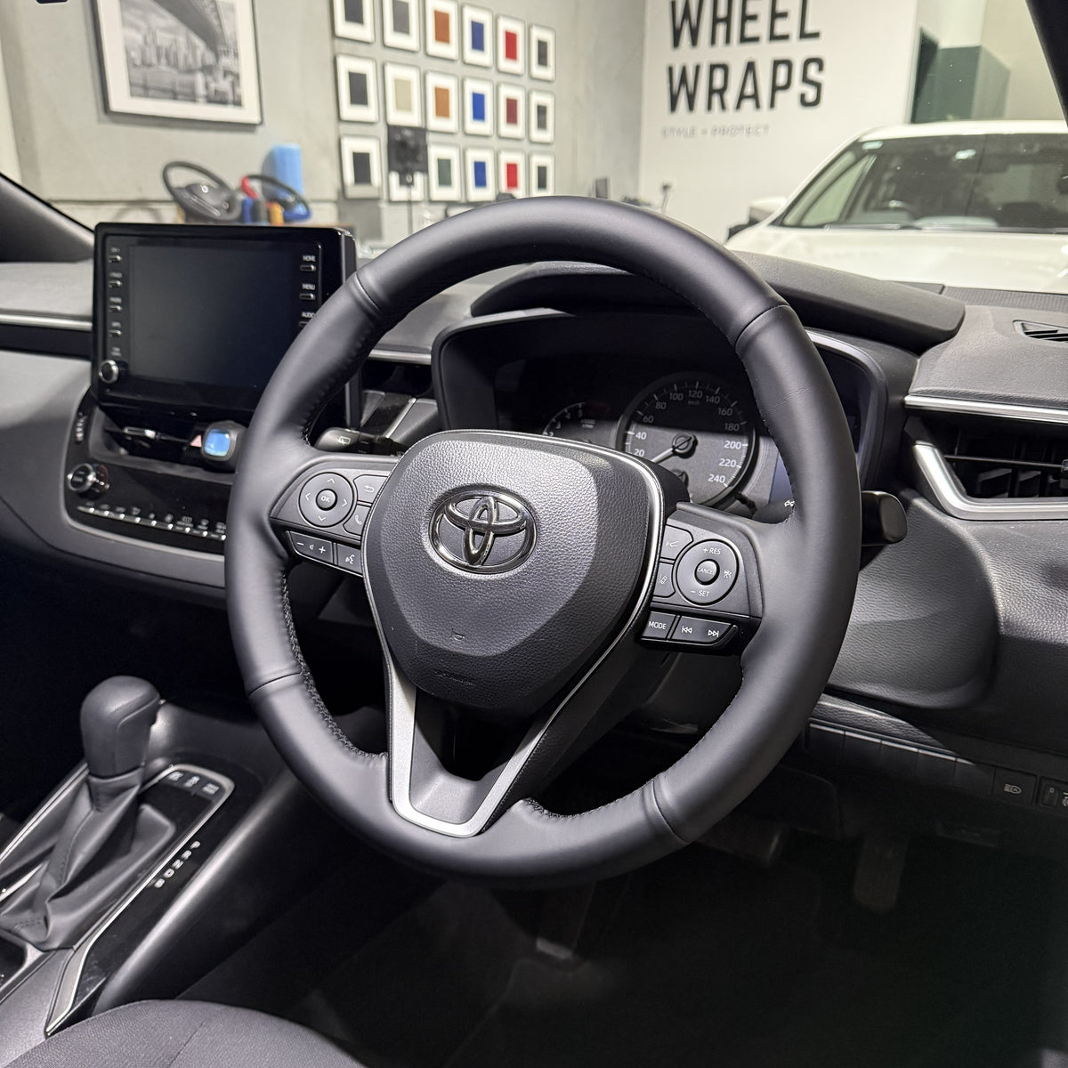 Toyota Corolla (2019+) Steering Wheel Wrap – Black Smooth Leather, Black stitch