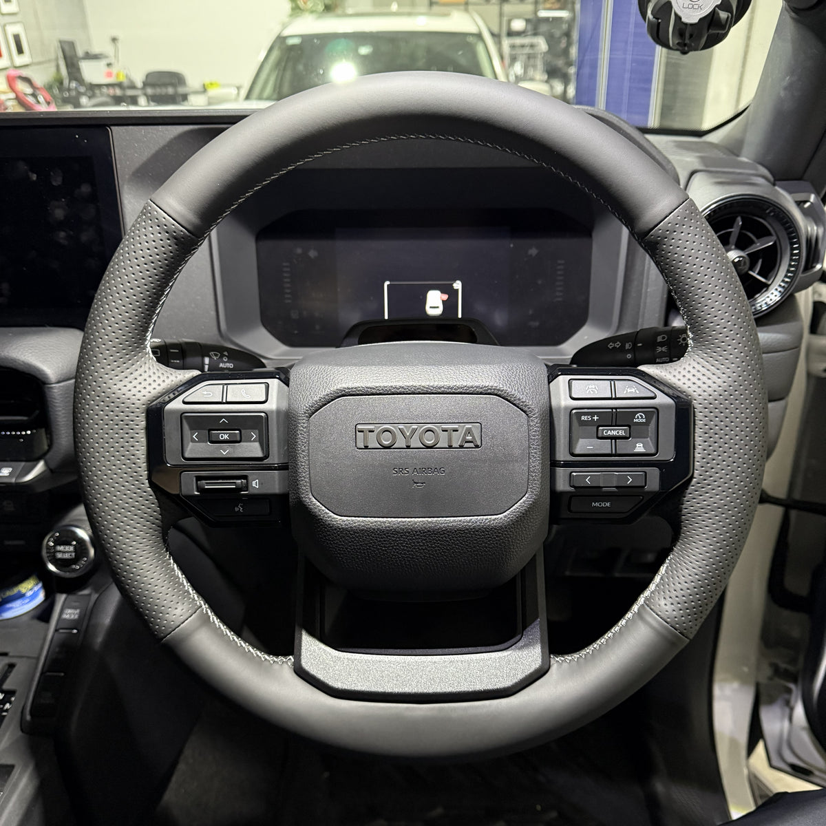 Toyota Prado 250 Series (2024+) Steering Wheel Wrap – Black Leather (smooth top, perforated sides), Grey stitch