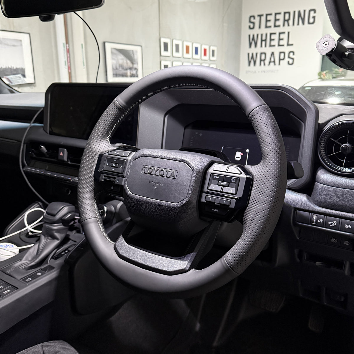 Toyota Prado 250 Series (2024+) Steering Wheel Wrap – Black Leather (smooth top, perforated sides), Grey stitch