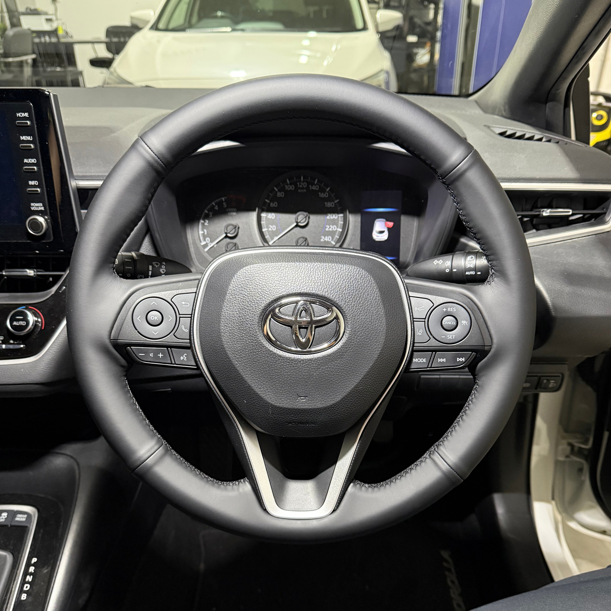 Toyota Corolla (2019+) Steering Wheel Wrap – Black Smooth Leather, Black stitch