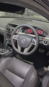 Holden Commodore VE (2006–2013) Steering Wheel Wrap – Black Leather (smooth top, perforated sides), Red stitch